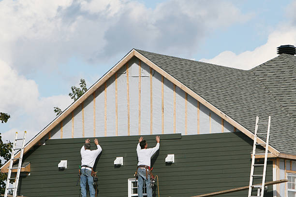 Professional Siding technician working in Blue Rock, OH